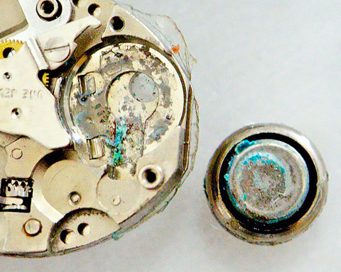 Corroded watch movement from a battery leaking